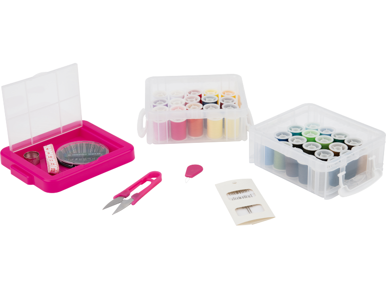 Sewing kit with thread boxes, needles, scissors, and accessories in fuchsia and clear.