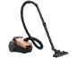 Compact copper and black canister vacuum cleaner with hose and nozzle.