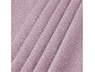 Lilac fabric with small white polka dots and folds.