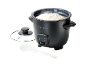 Black rice cooker with cooked rice, open lid, and white spoon.