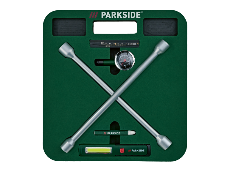 Car tool kit with cross wrench, pressure gauge, and flashlight, in a green tray.