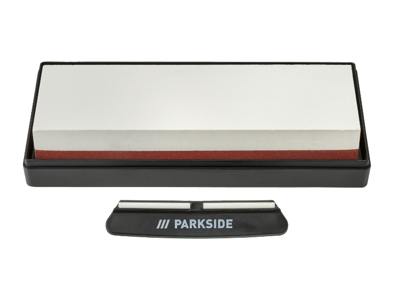 Dual-grit sharpening stone with a sharpening guide