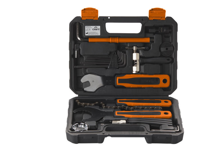 Open bicycle repair tool kit with various tools, including wrenches, chain tools, and hex keys.