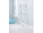 White clothes drying rack and blue laundry basket in a bright room.