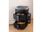 Dual-basket air fryer with chicken and fries, set to 180 degrees.