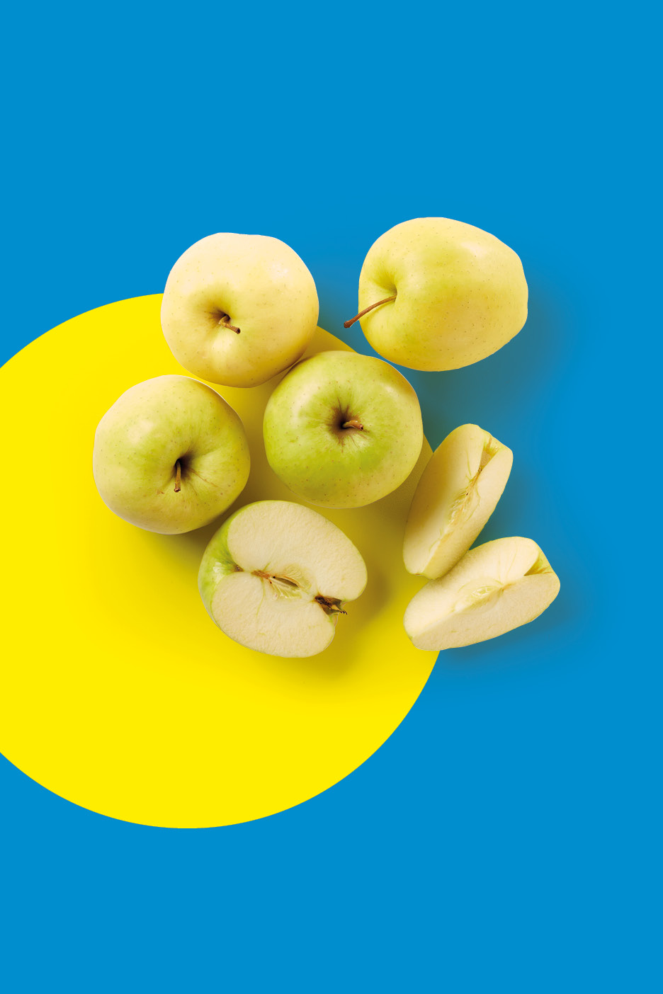 Green and yellow apples, whole and sliced, on a blue and yellow background.