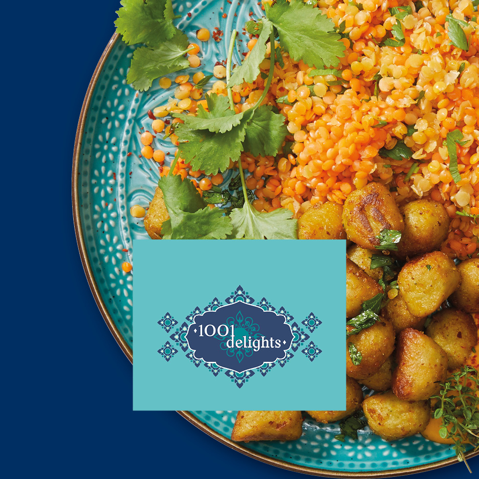 A plate of lentils and roasted potatoes, garnished with cilantro, with a '1001 delights' logo.