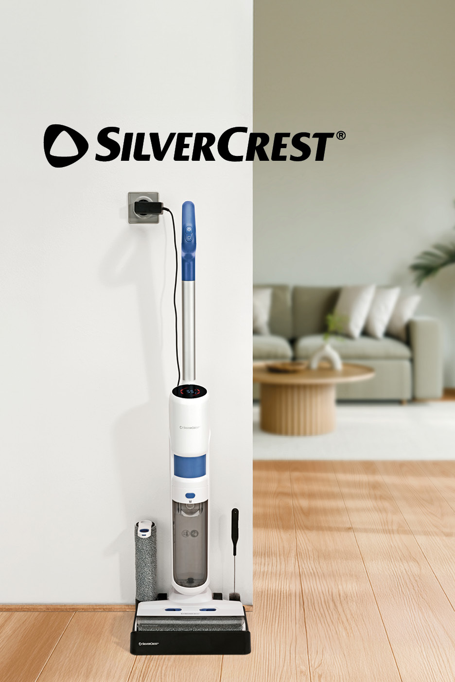 Cordless wet and dry vacuum cleaner charging in a modern living room.