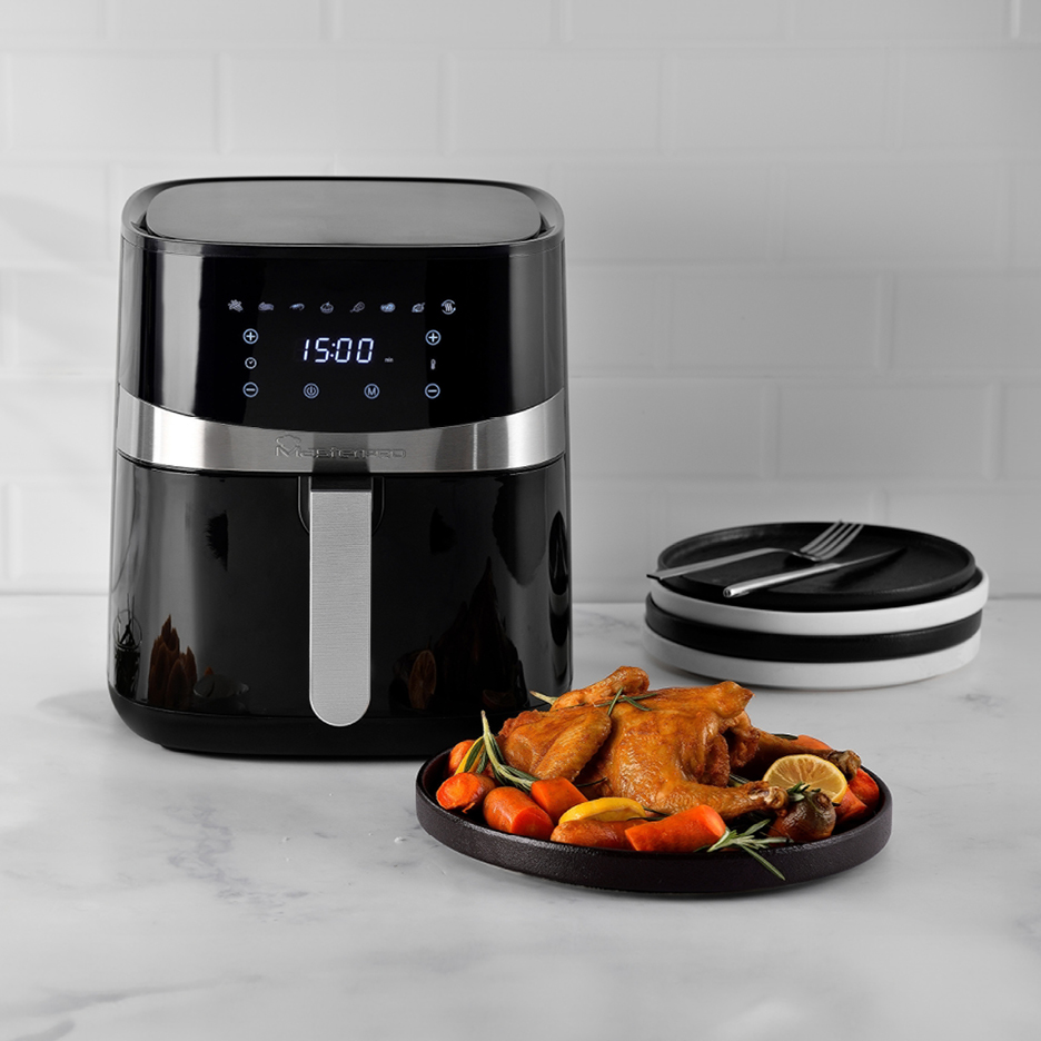 Masterpro air fryer with a roasted chicken and vegetables on a plate
