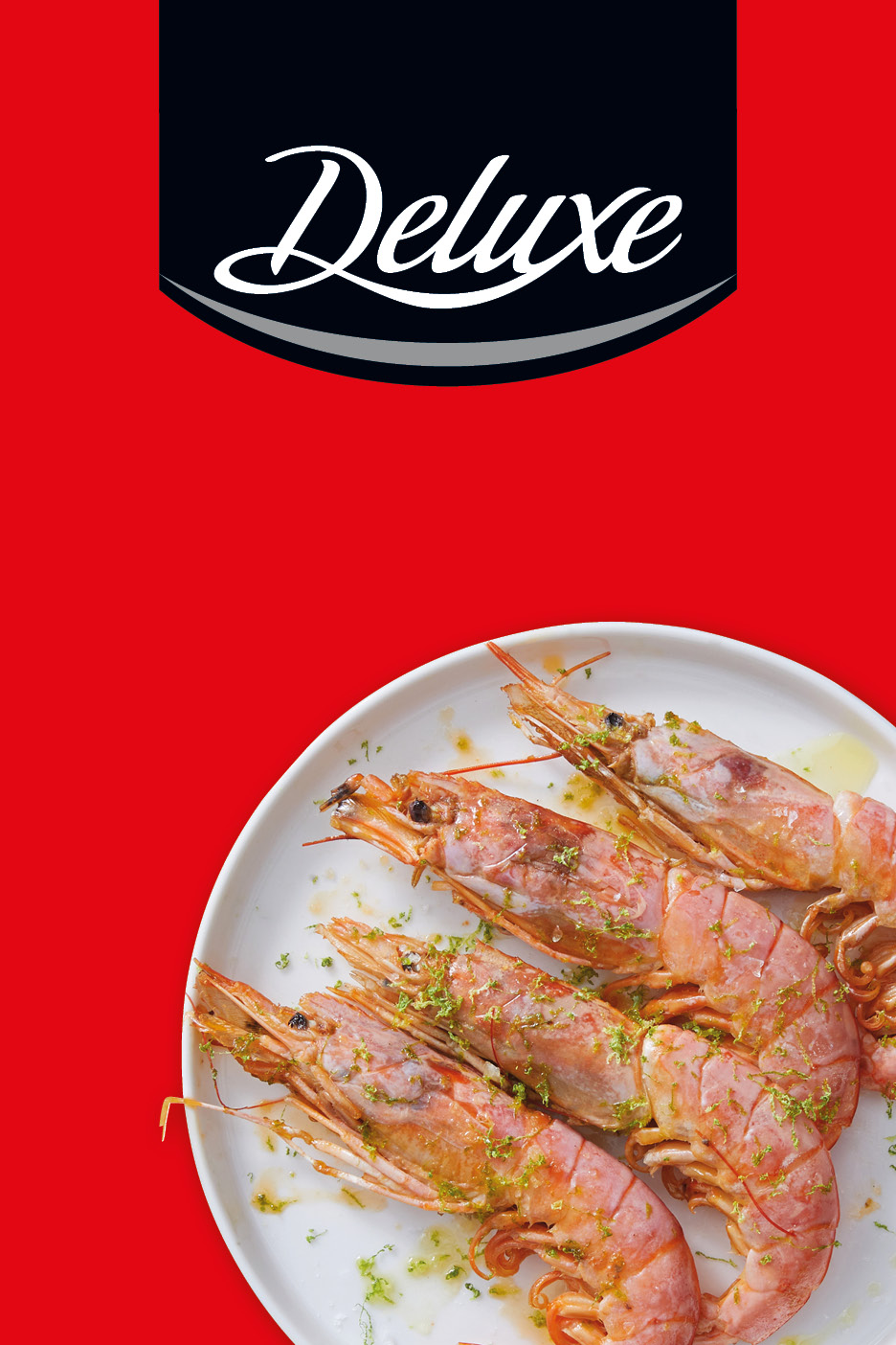 Cooked whole prawns with lime zest on a white plate against a red background.