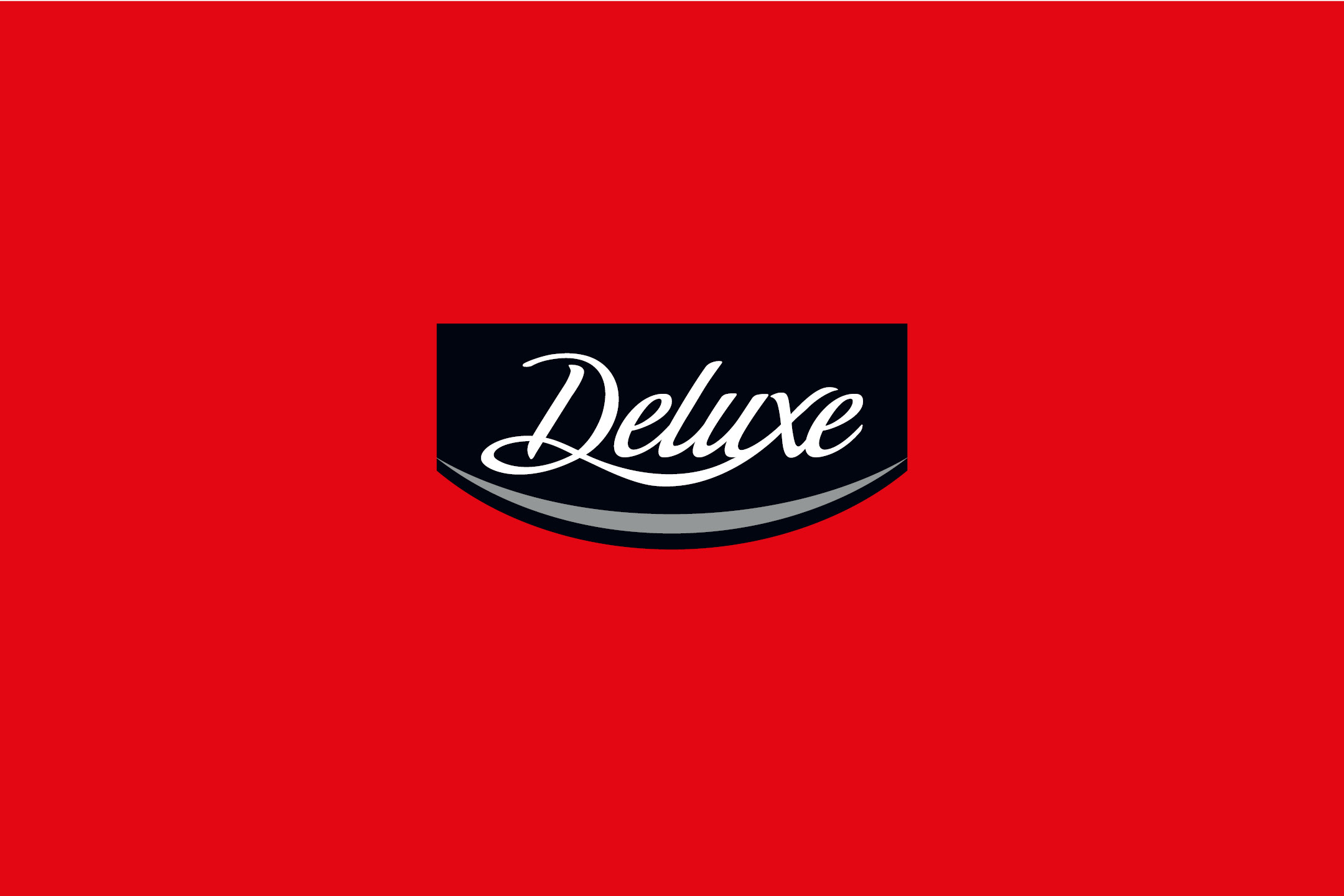White cursive text reading Deluxe on a black and red background.
