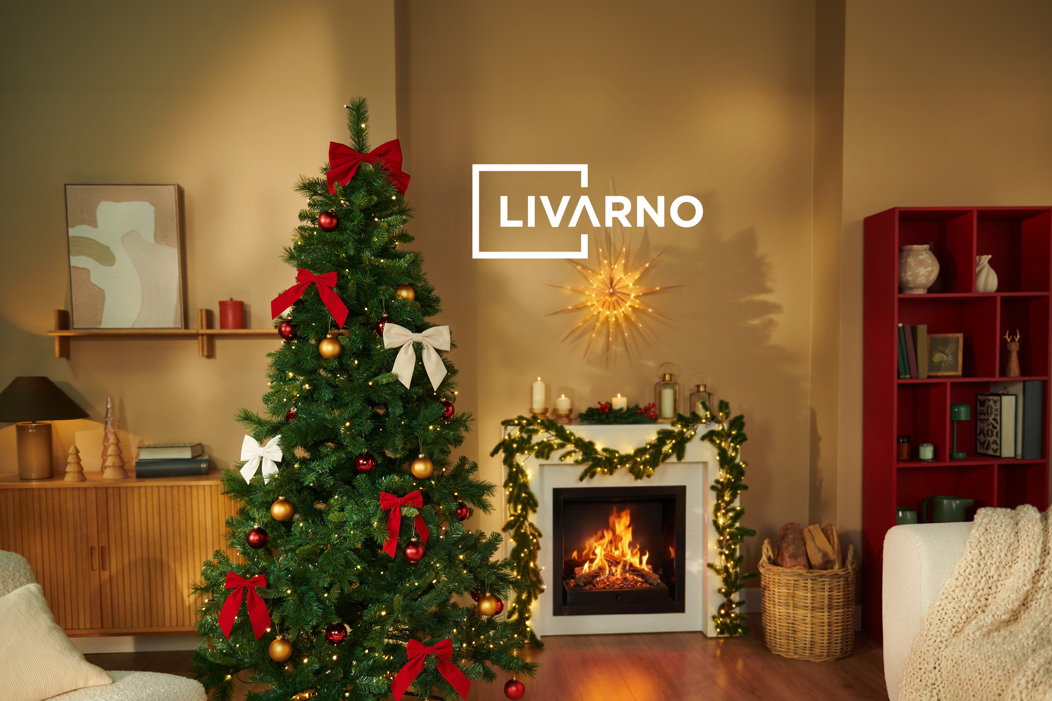 Cozy Christmas living room with a decorated tree, lit fireplace garland, and warm holiday decor.