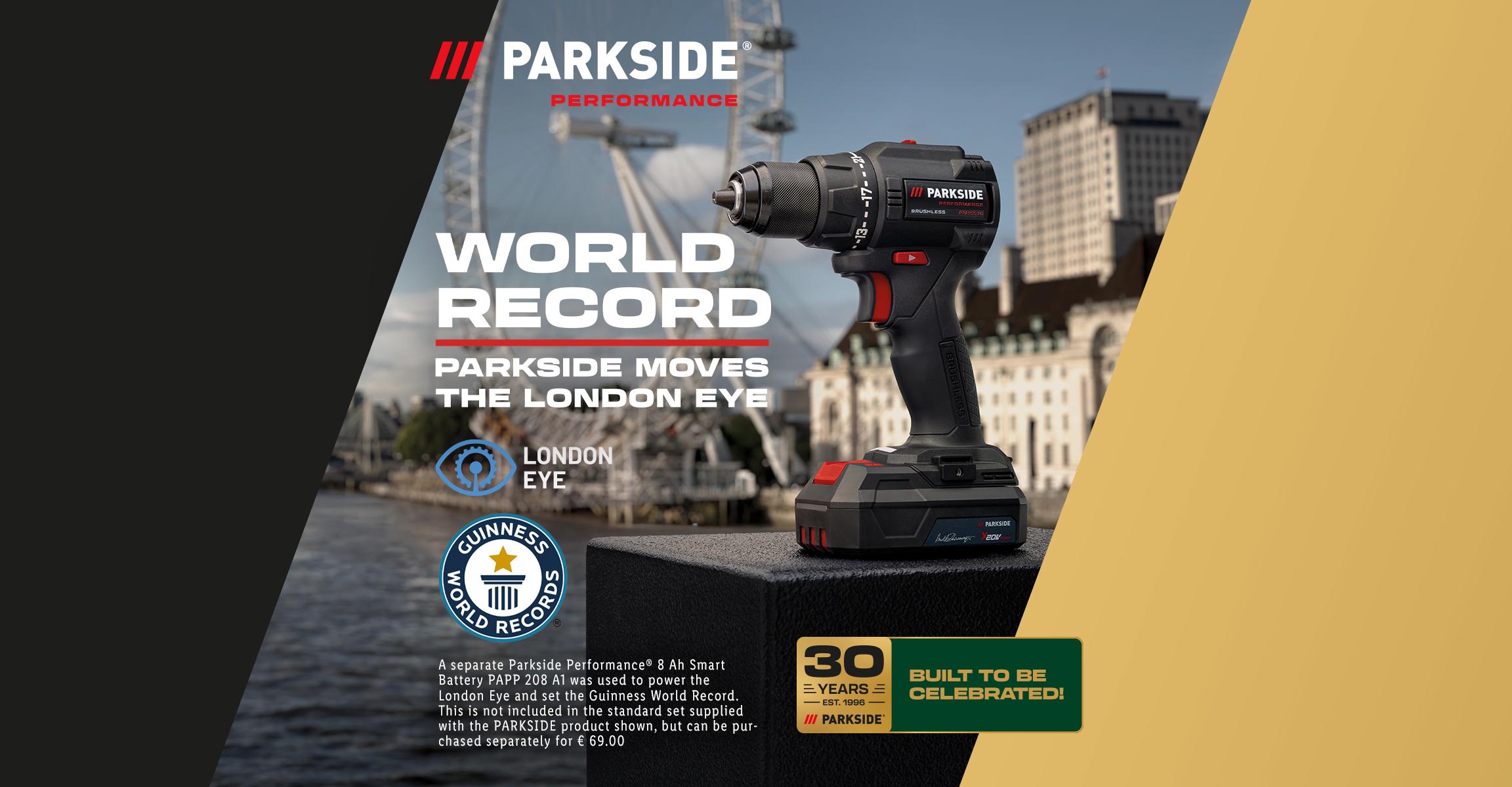 Cordless drill with a battery, Guinness World Records logo, and text about moving the London Eye.