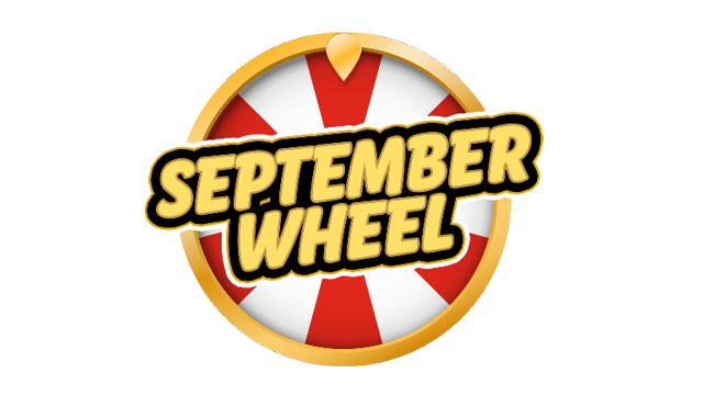 A September Wheel with a red and white design and gold trim.
