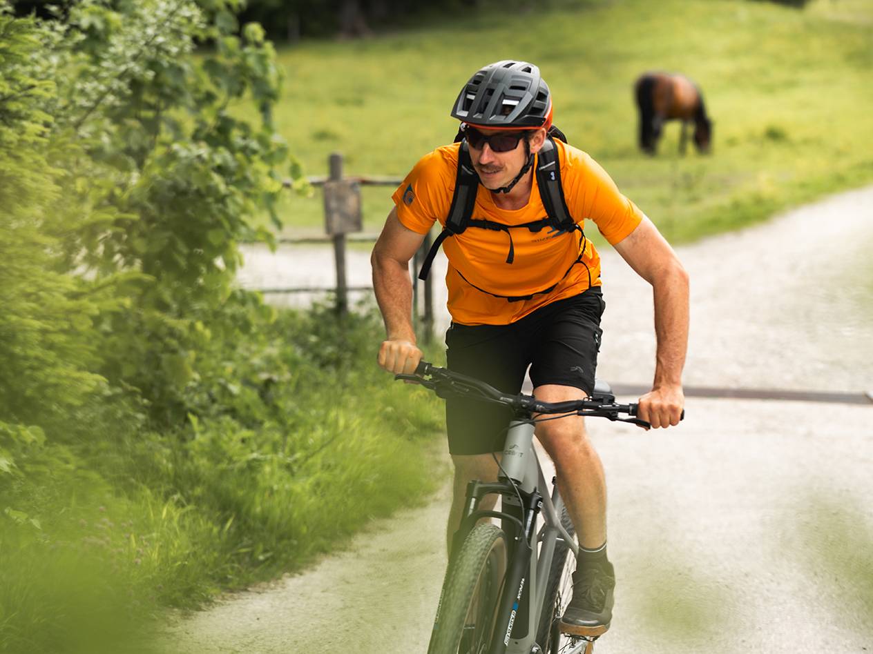 E-bike and cycling gear outdoors.